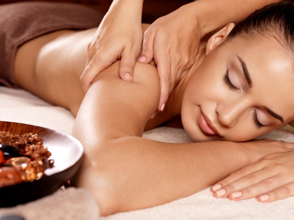 Woman rewarding herself with a spa treatment