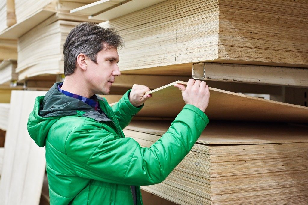 Man choosing a plywood