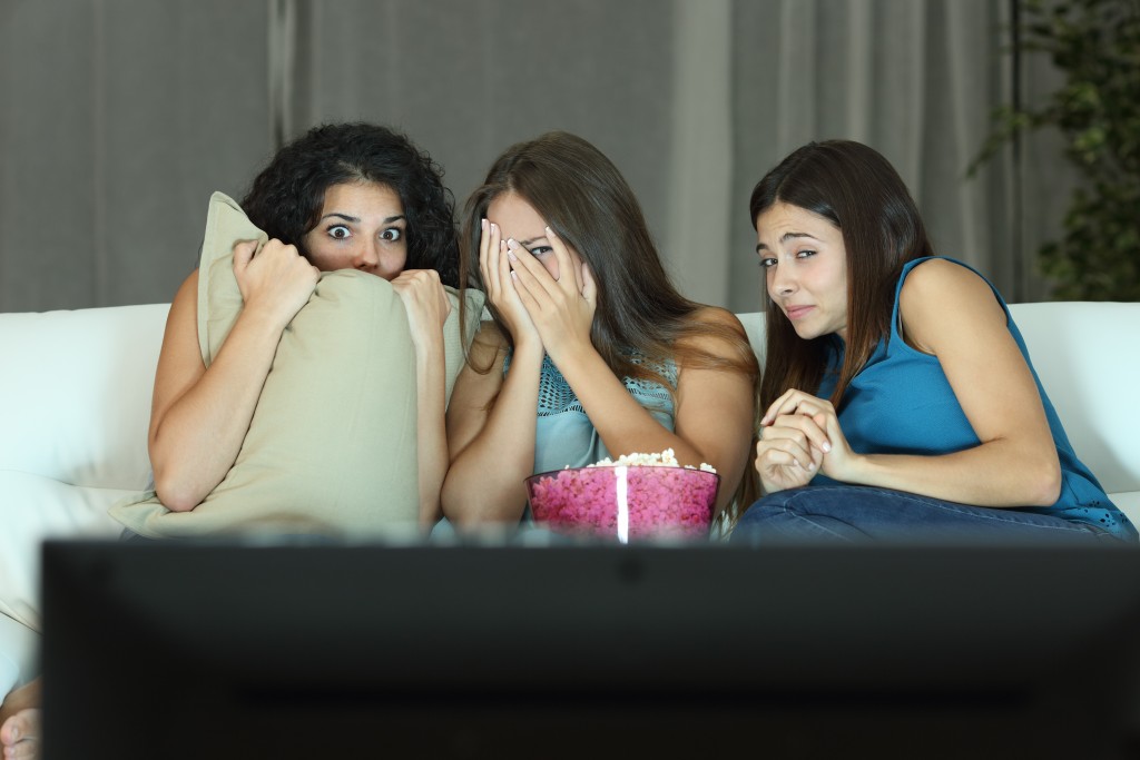 Girls watching a horror movie
