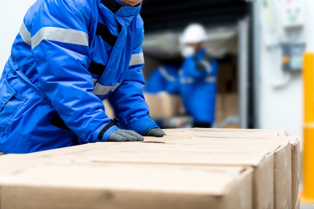 Boxes carried out of the warehouse