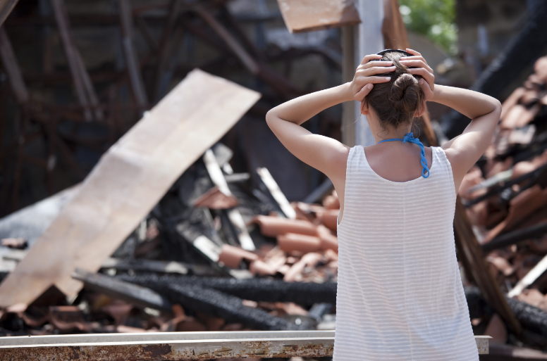 Woman worried about the earthquake damage 