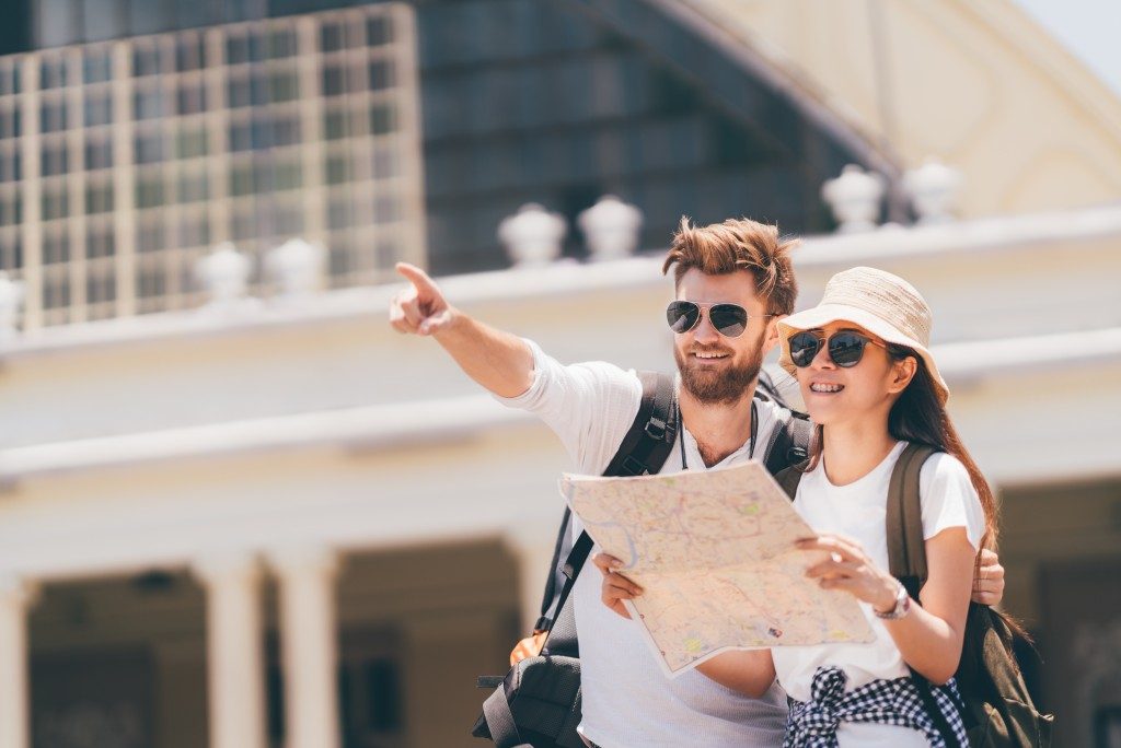 Tourist couple pointing at something