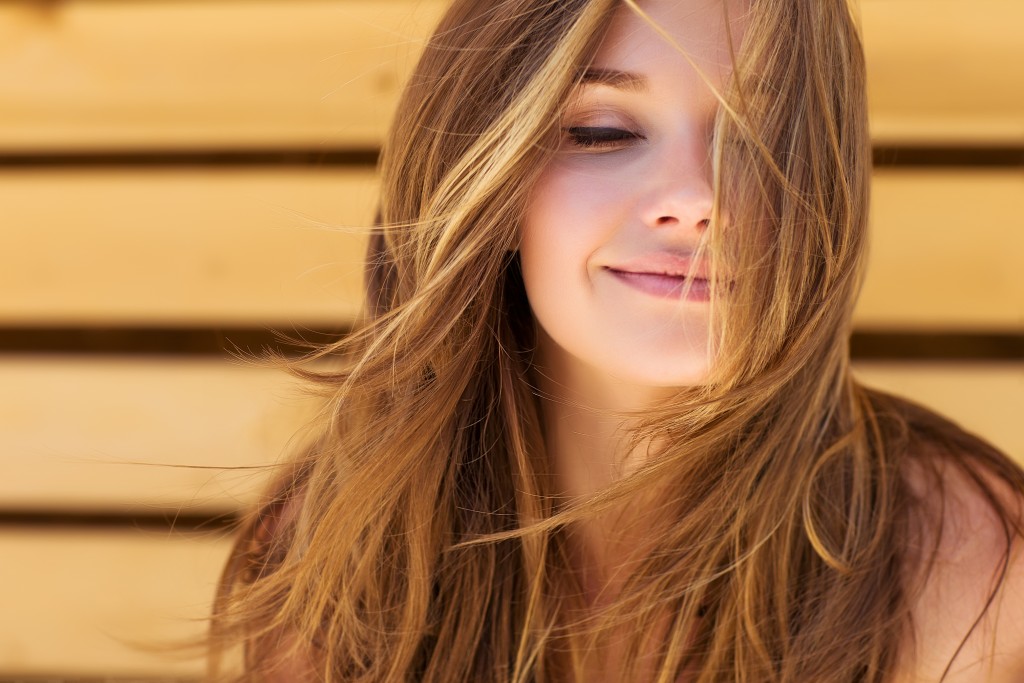 Woman with long hair smiling