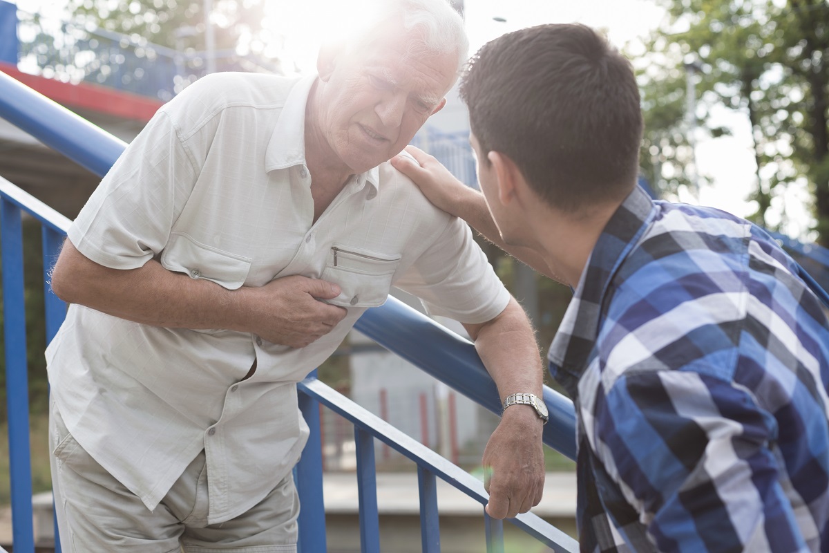 old man having a heart attack