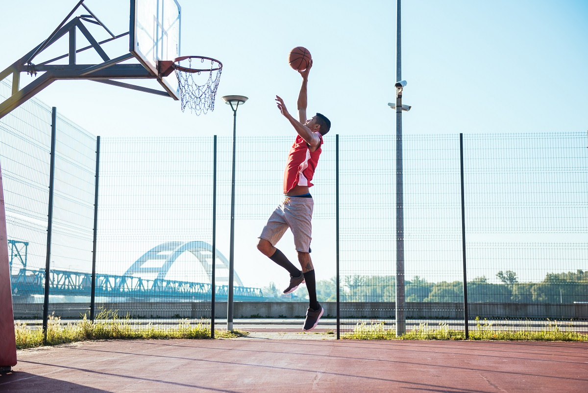 Basketball player about to dunk