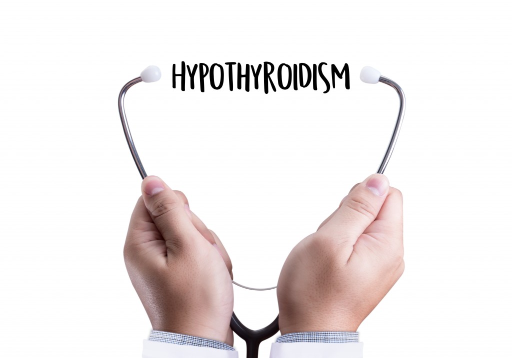 doctor holding stethoscope with hypothyroidism