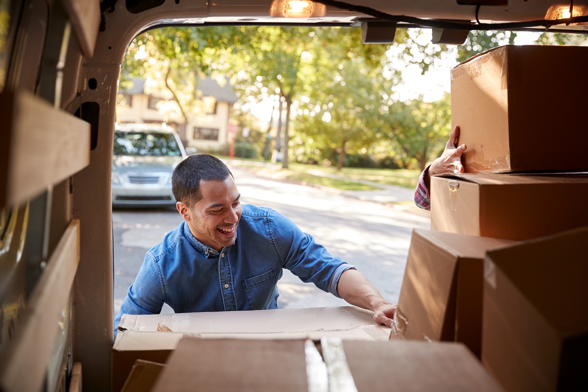 man unloading boxes