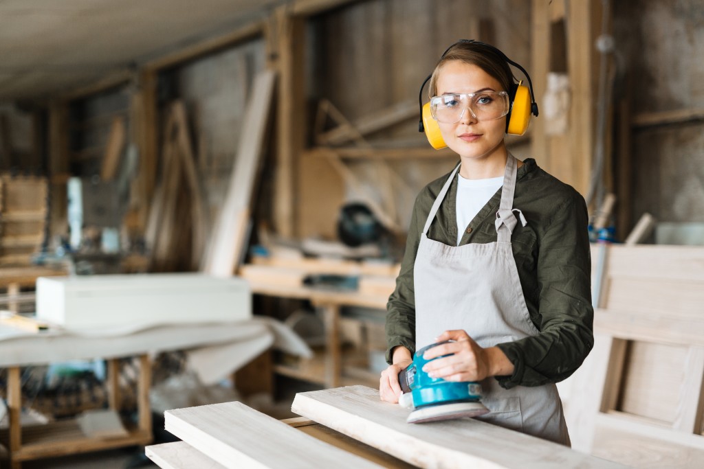 Female in carpentry workshop