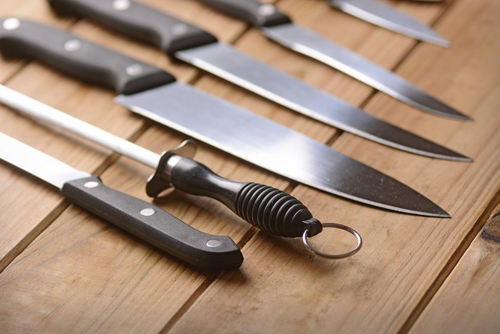 Knives on a wooden table