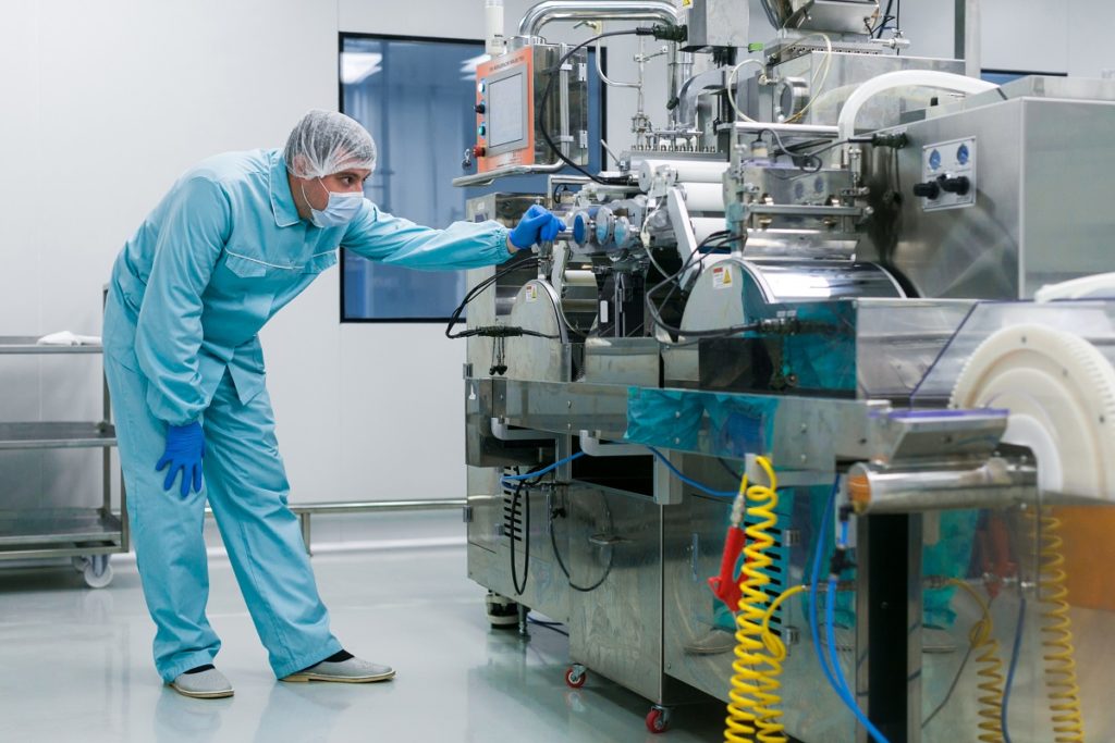 man operating a machine