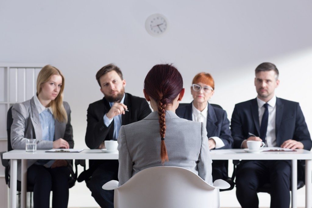 Applicant with interviewers