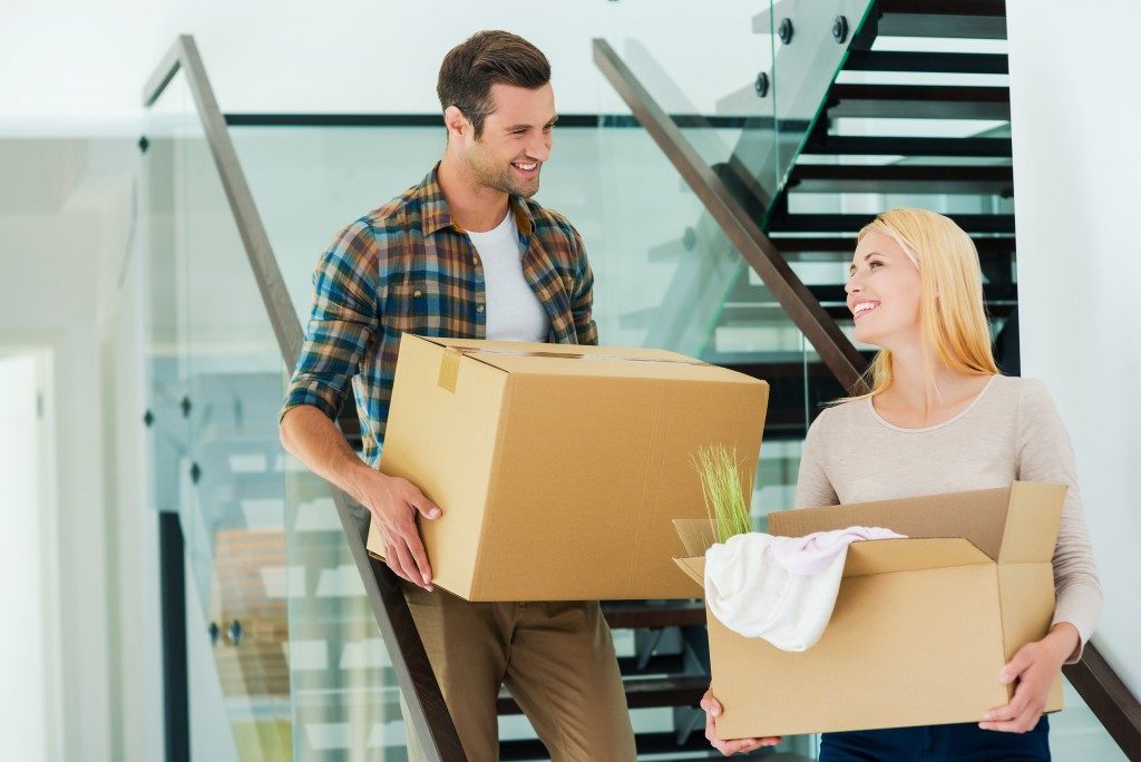 couple moving boxes