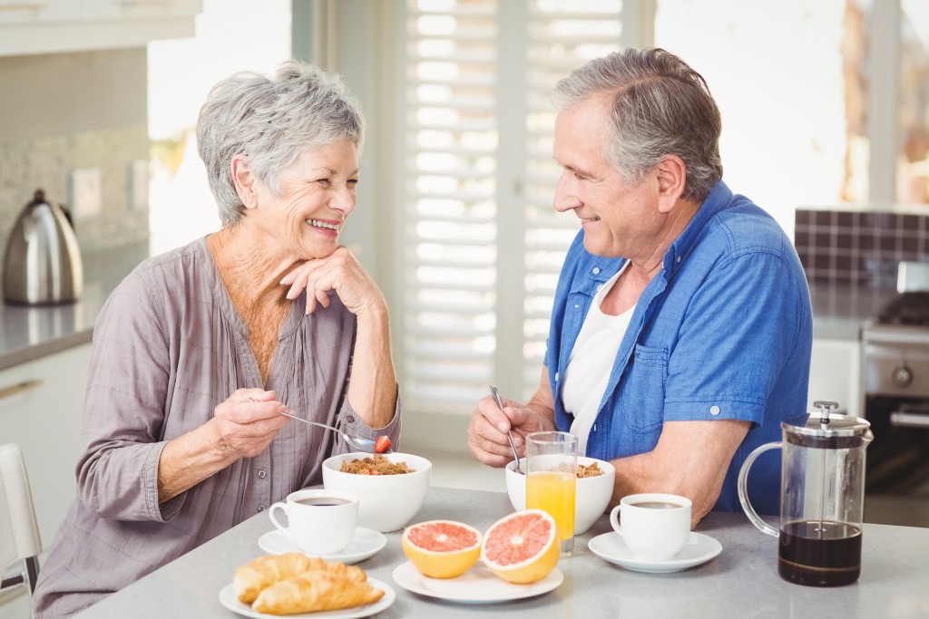 senior couple eating together