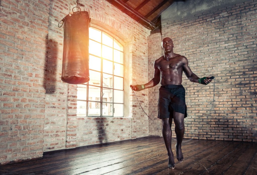 man skipping at the gym