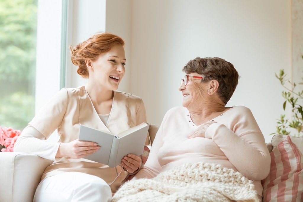 reading a book with a senior