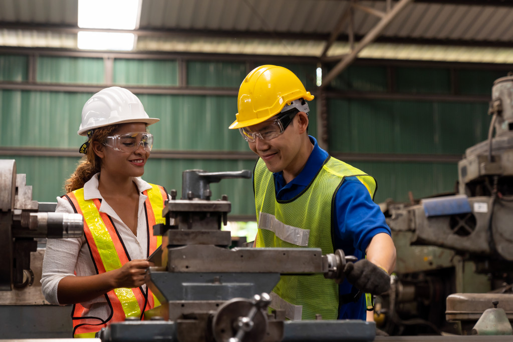 Maintenance workers utilizing tools