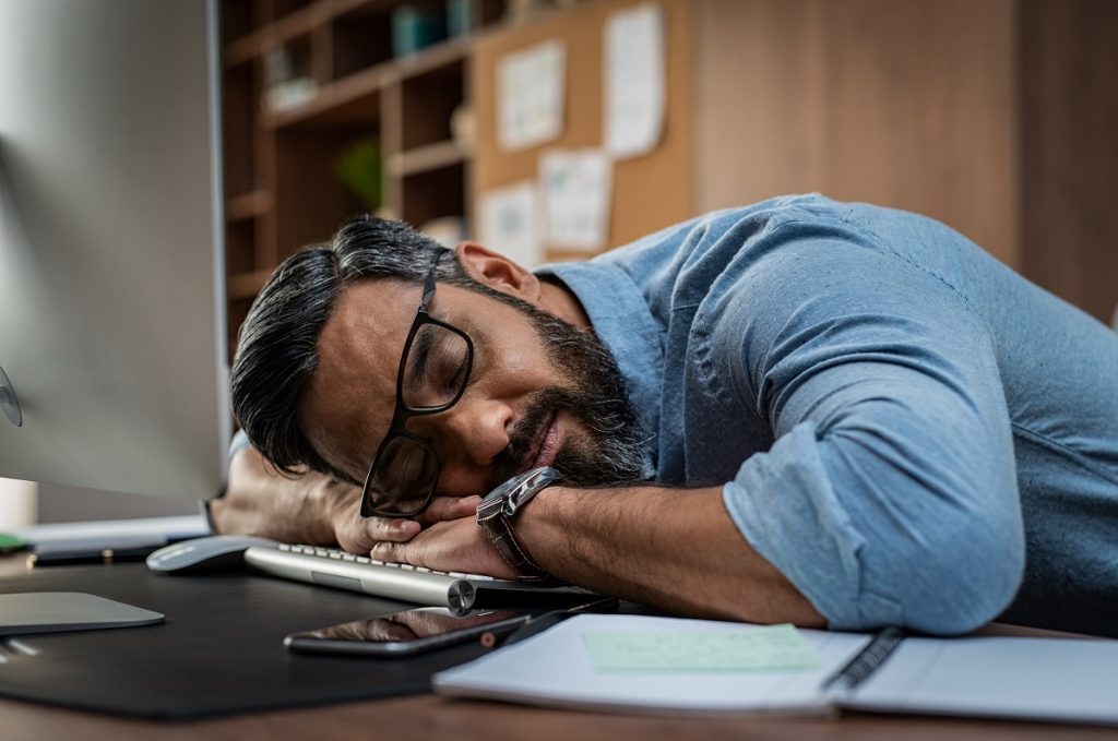 a man sleeping during work hours